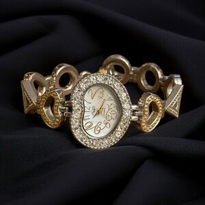 Vintage Sanis two tone heart shaped rhinestone watch